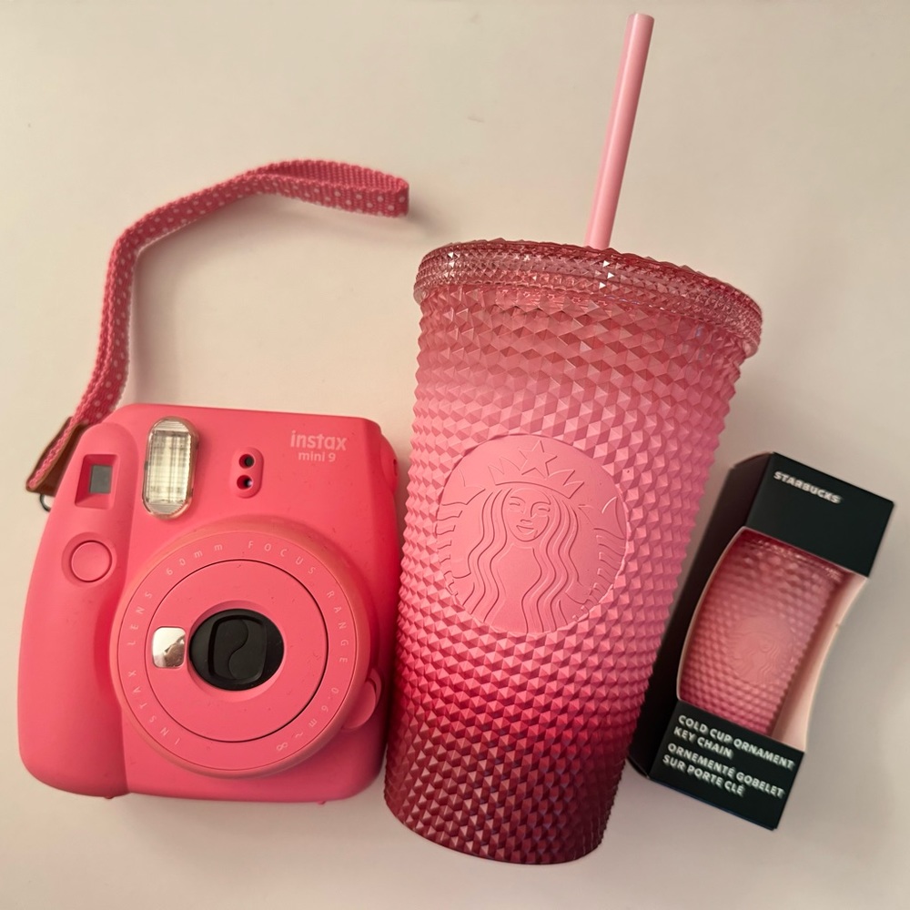 Pink instax mini 9, Starbucks Grande cup and Starbucks keychain